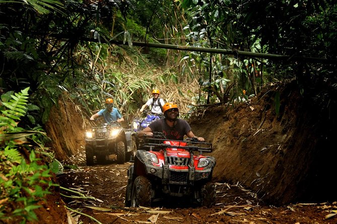 ATV Combo Horseback Riding, ATV, Ziplines, Cenote and Lunch - ATV riding on a rough jungle course