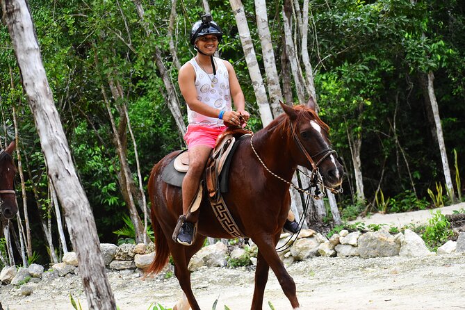 ATV (shared), Horse Back Riding, Ziplines, & Cenote from Cancún - Lunch keeps the busy schedule practical