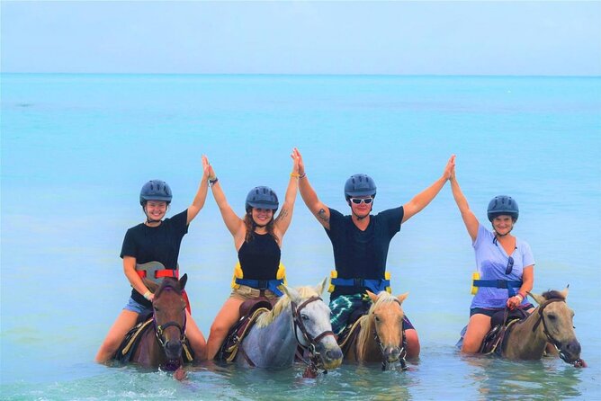 ATV, Zipline, Horseback, Bamboo Rafting & Catamaran Boat Jamaica - Catamaran music, dancing, and optional snorkeling