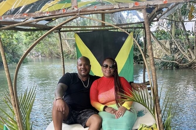 Bamboo Rafting and HorseBack Riding Excursion in OchoRios Jamaica - Drifting downstream on a 30-foot bamboo raft