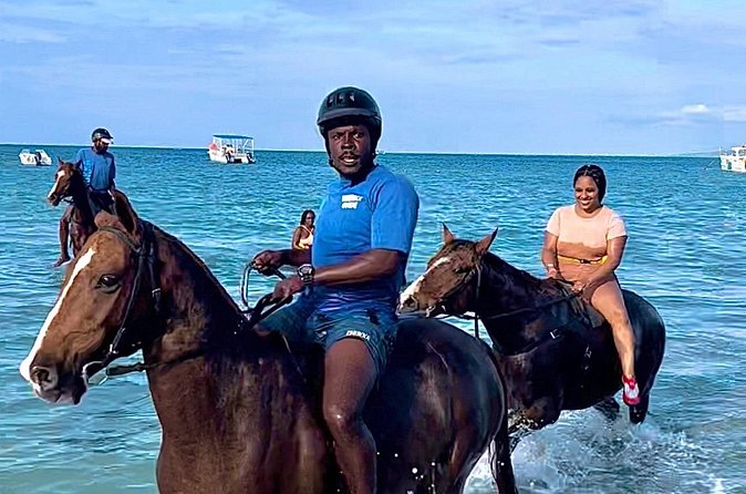 Bamboo Rafting, Dunns River , Zipline And Horseback Ride Combo - White River bamboo rafting in Ocho Rios