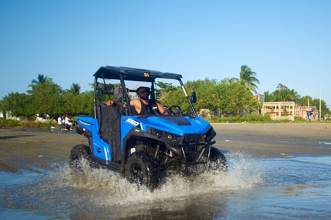 Cartagena ATV Buggy and Horseback riding Beach and Barrio Tour - Crossing the bridge above La Cienega