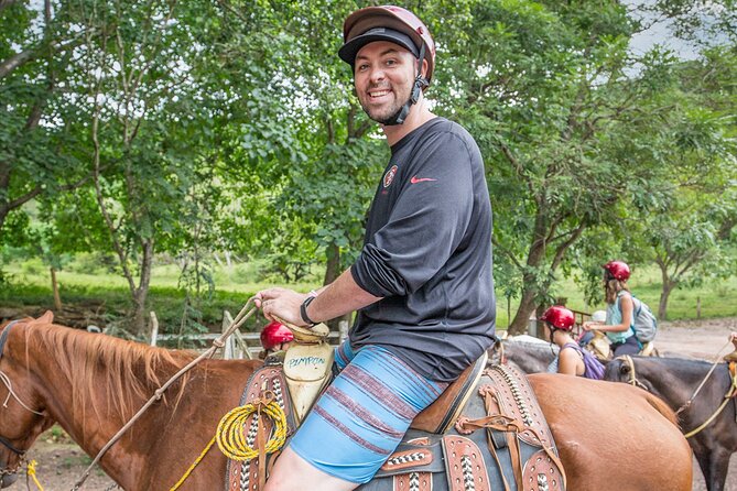 Combo Horseback Riding in Vallarta with ATV and Ziplines. - Horseback riding through rivers and jungle