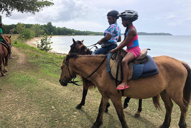 Customize Day Tour In Ochi (Horseback Riding,Rafting,Blue Hole, Dunns River ) - White River rafting on a 30-foot bamboo raft