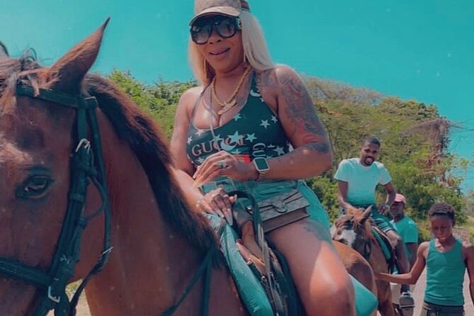 Dunn’s River Falls,Zip lining & horseback riding Combo tour from Montego Bay - Climbing Dunn’s River Falls with a guide