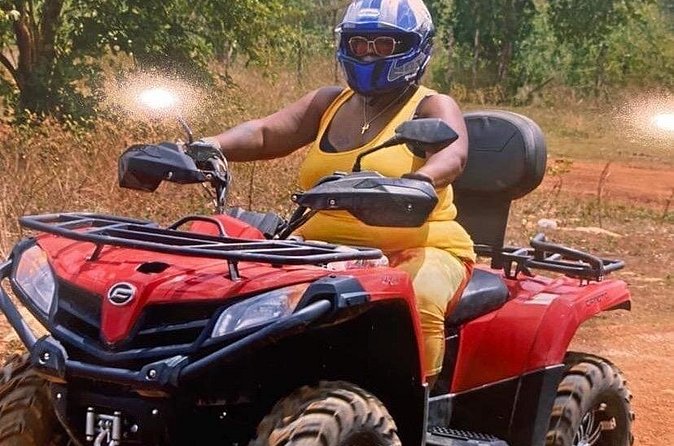 Full Day Private ATV with Zipline and Horseback Riding in Negril - Ziplining above the Caribbean water