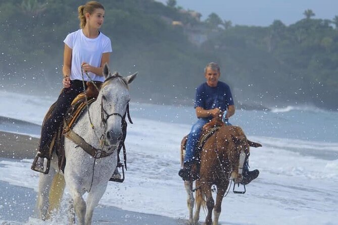 Horseback Riding in Sayulita Through Jungle Trails to the Beach - Playa Escondida and the black-sand beach ride