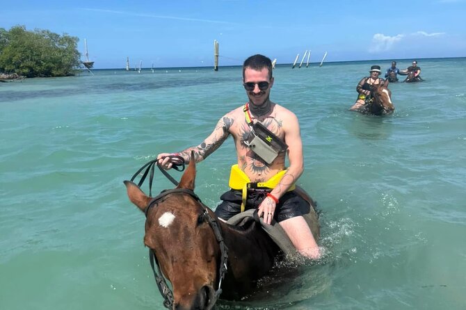 Horseback Riding In The Ocean from Montego Bay Private Transfer - Entering the Caribbean water