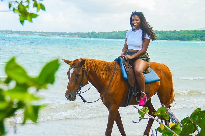 Jamaica's Ocean Horseback Bamboo Raft Adventure and Transport - Riding through the gentle ocean waves