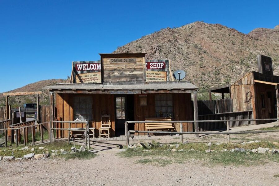 Las Vegas: Grand Canyon Ranch Tour with Horseback/Wagon Ride - Arriving at a ranch with outlaw roots