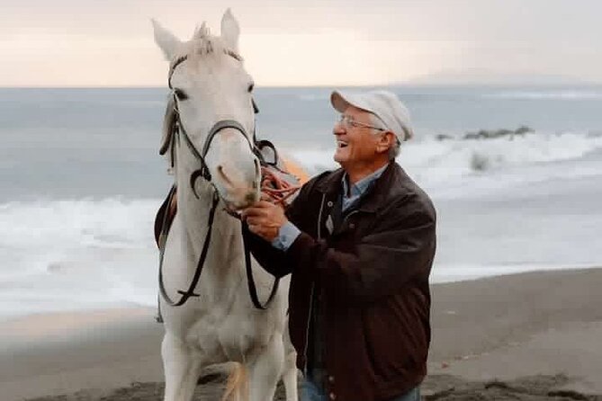 Premium Secluded Black Beach Horseback Riding Tour in Santorini - Riding from the stable toward Monolithos Beach