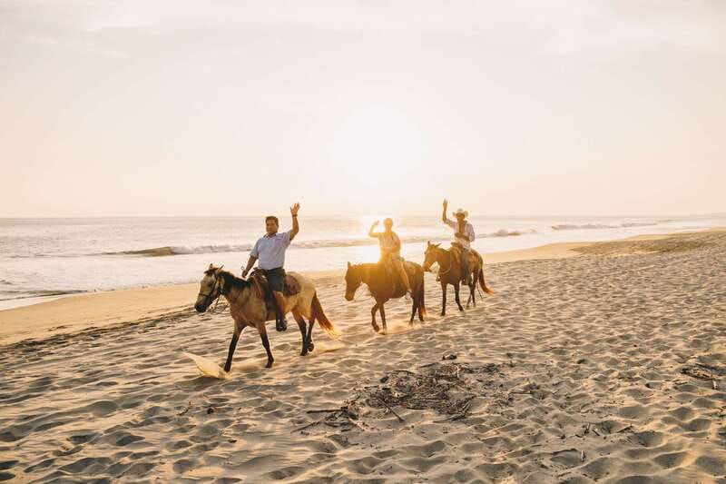 Puerto Escondido: Sunset Horse Back Riding Tour - Crossing the Río del Maíz several times
