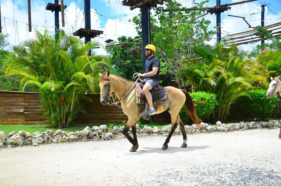Punta Cana: Bávaro Adventure Park Horse Riding & Waterfalls - Cooling off at the Waterfall Pool