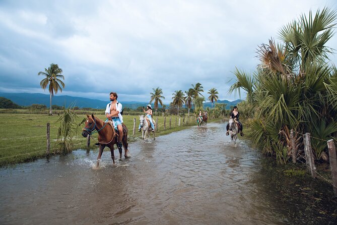 River Trail Horseback Riding Adventure - Riding through the countryside near Laguna Manialtepec