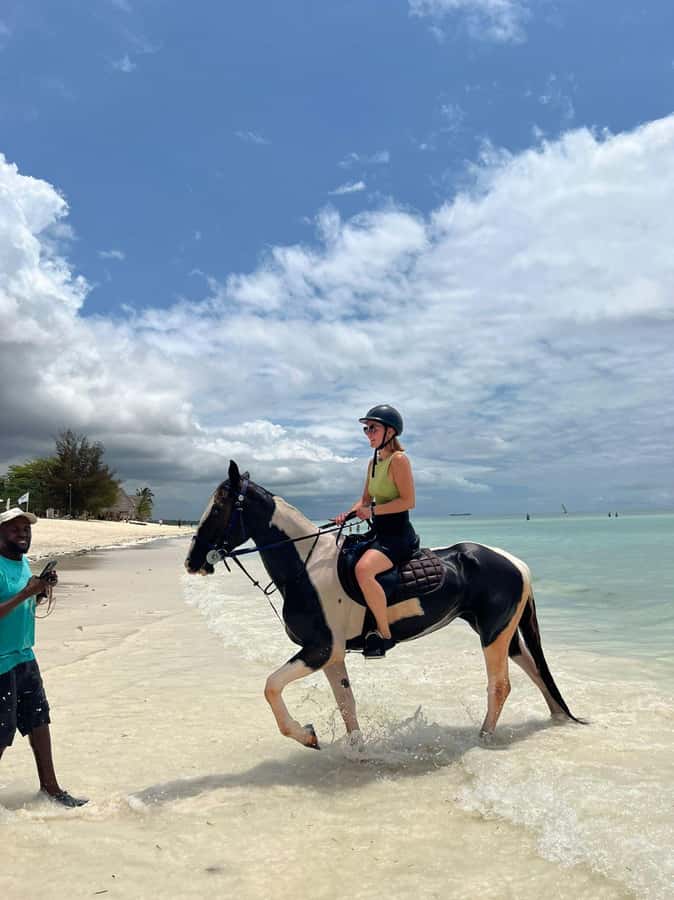 Zanzibar: Beach Horseback Ride and Swim with the Horse - Pickup from your Zanzibar hotel